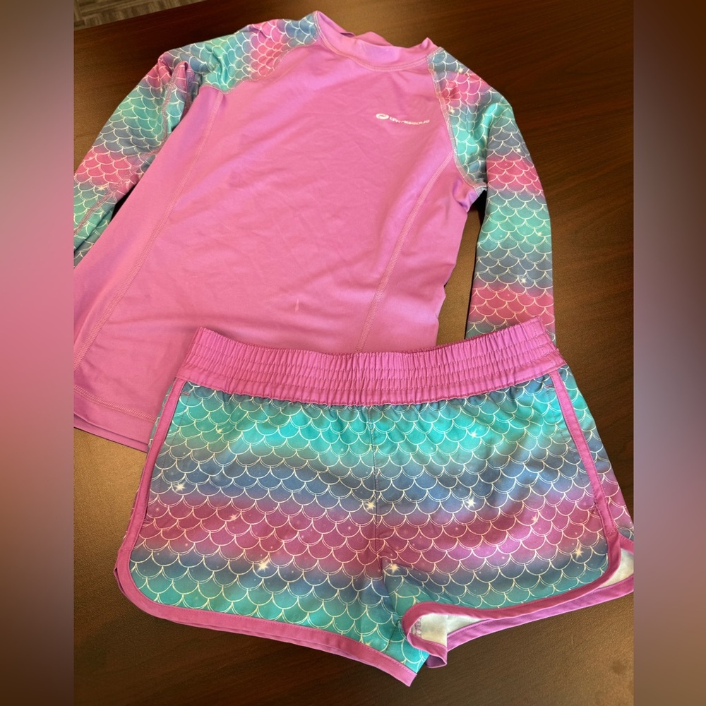Kids medium O’Rageous swim shorts and matching swim shirt